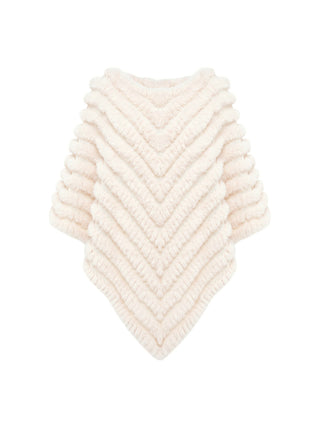 Poncho in faux fur con spilla