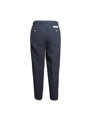 Loose trousers with pleats