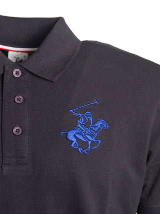 Polo in cotone con ricamo