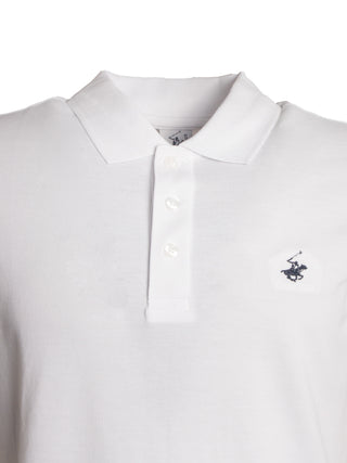 Polo in cotone con ricamo