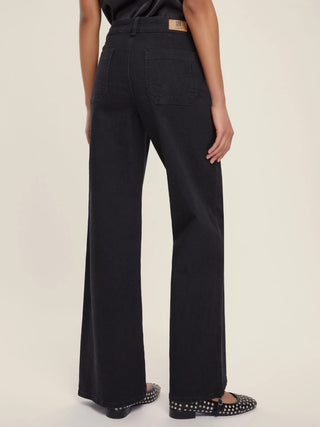 Jeans con tasche applicate