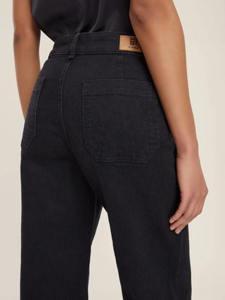 Jeans con tasche applicate