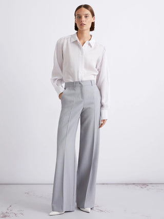 Pantalone dritto in tela stretch malfilé