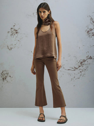 Top con fiore abbinato