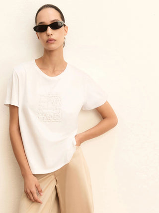 T-shirt con logo e paillette