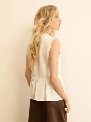 Top con balza in viscosa e lino