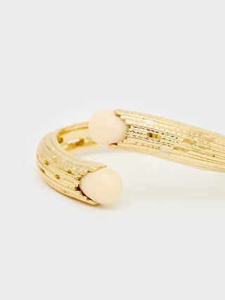 Bracciale apribile lavorato bianco/oro