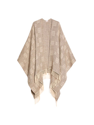 Poncho jacquard con frange
