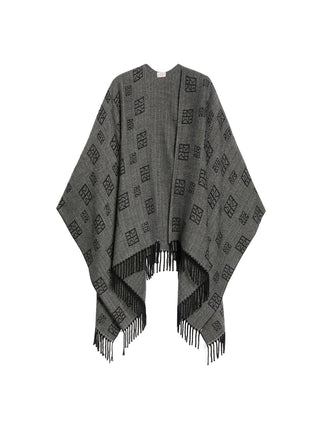 Poncho jacquard con frange